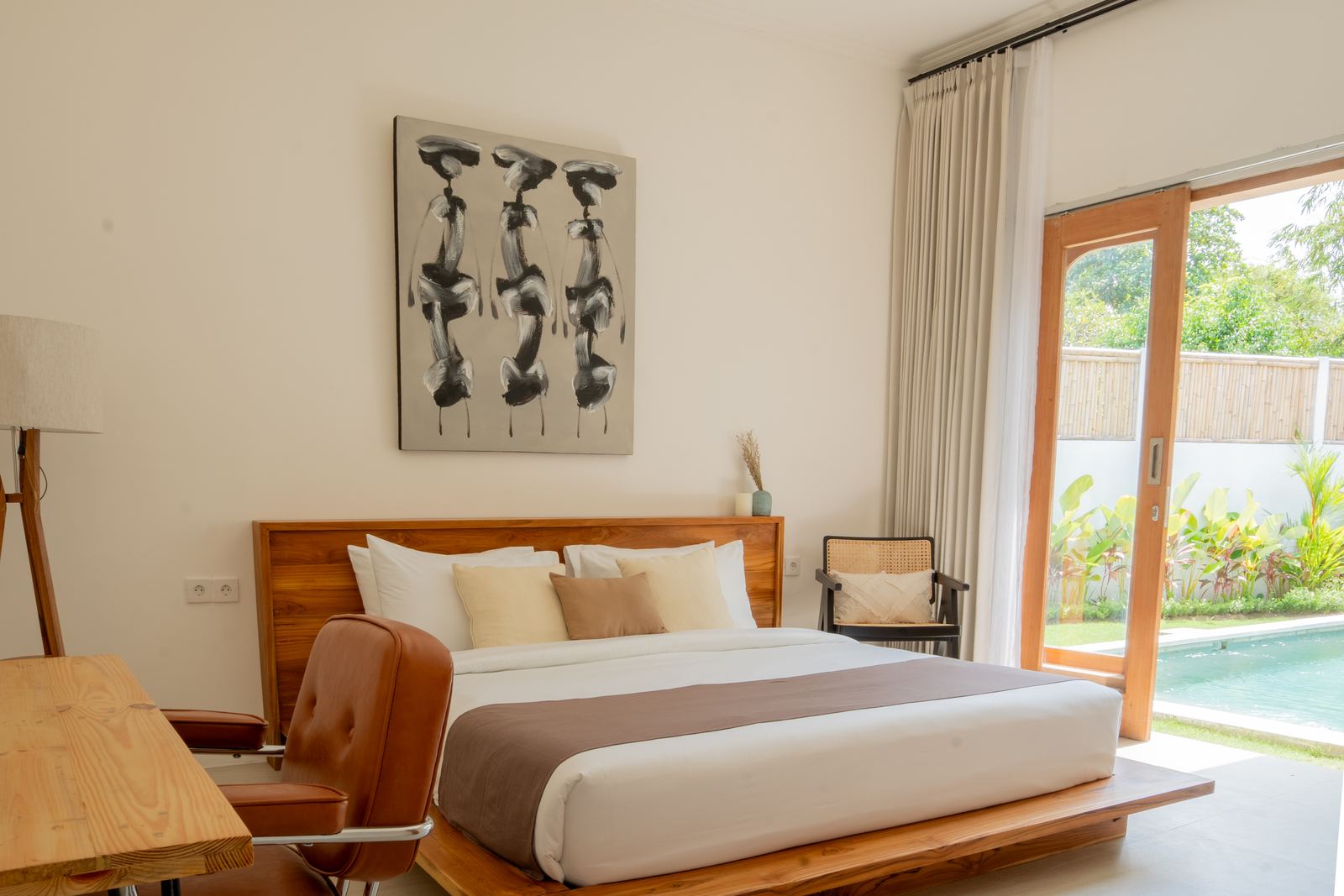 Bedroom with view of the pool