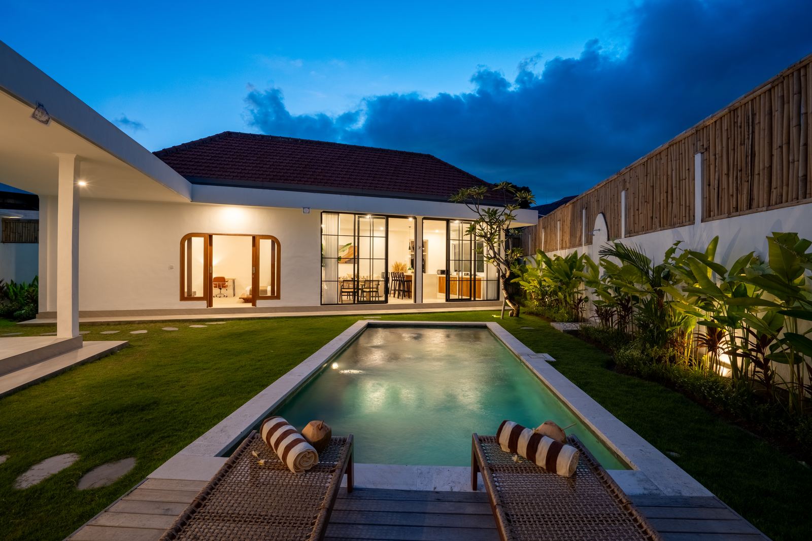 Villa Guerrero pool and living area at dusk